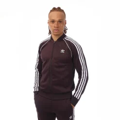 Tracksuits*adidas Originals SST Primeblue Track Top in Burgundy