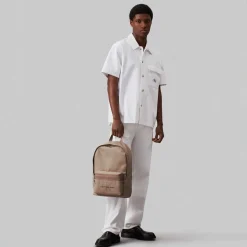 Bags*Calvin Klein Logo Round Backpack in Grey