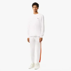 Trousers*Lacoste Tapered Leg Sweatpants in white orange