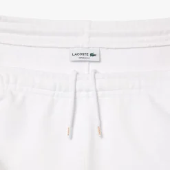 Trousers*Lacoste Tapered Leg Sweatpants in white orange