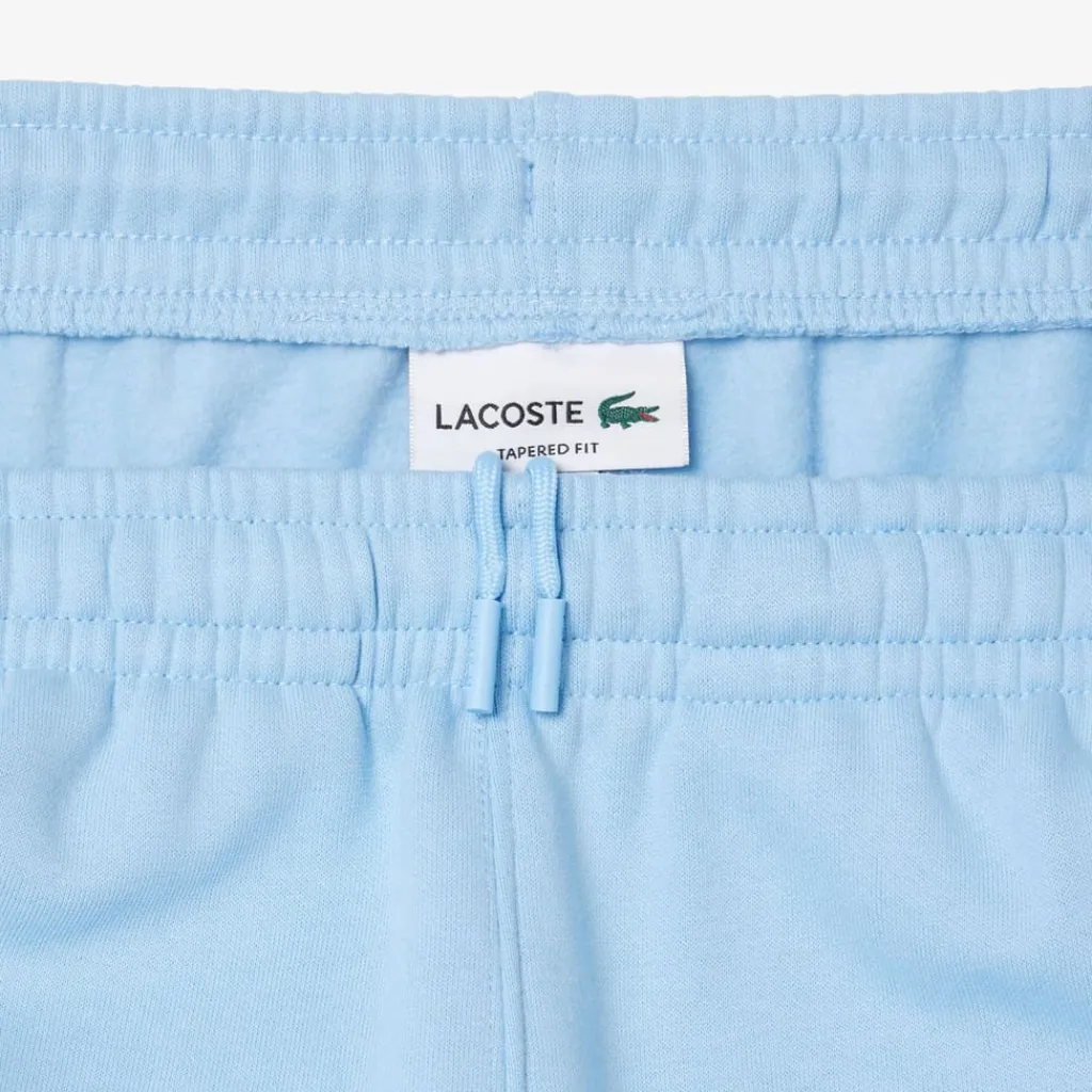 Trousers*Lacoste Tapered Leg Sweatpants in Light Blue