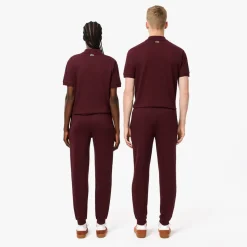Trousers*Lacoste Tapered Leg Sweatpants in red maroon