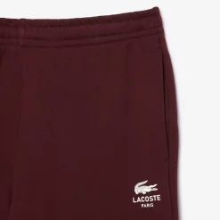 Trousers*Lacoste Tapered Leg Sweatpants in red maroon