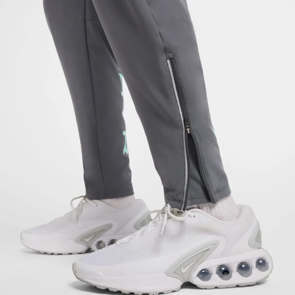 Trousers*Nike Air Run Zipped Pocket Pants in Grey